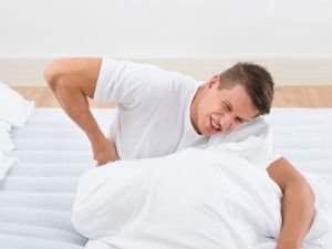 Боль в пояснице у мужчины